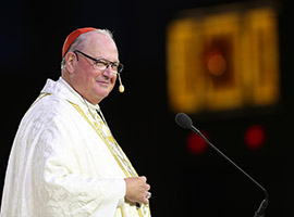 Cardinal Timothy M. Dolan of New York smiles as he delivers the homily during the opening Mass of the "Convocation of Catholic Leaders: The Joy of the Gospel in America" July 1 in Orlando, Fla. (CNS photo/Bob Roller)