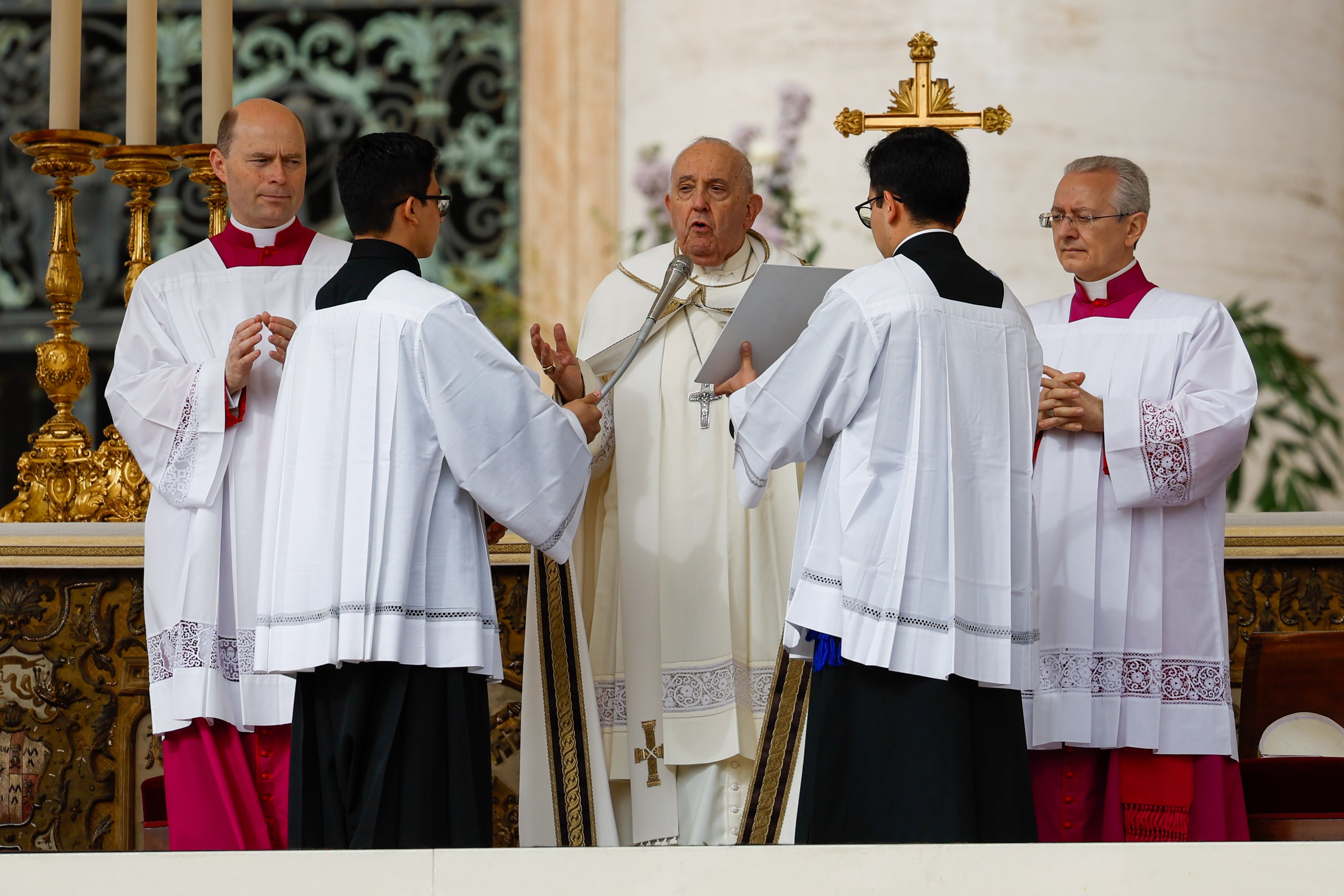 Pope Francis prays during Easter Mass.
