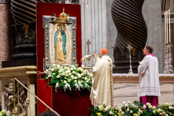 Cardinal Robert Prevost blesses an image of Our Lady of Guadalupe. 