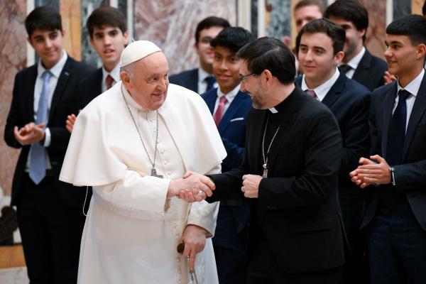 Pope Francis greets Cardinal José Cobo Cano of Madrid, Spain.