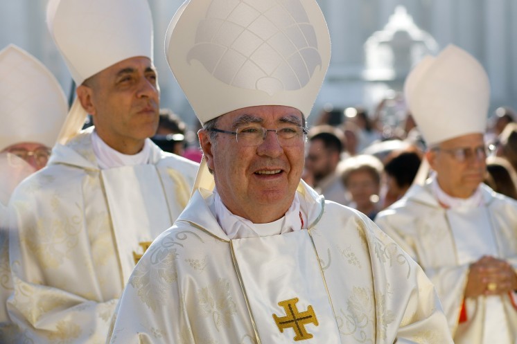 Cardinal Christophe Pierre processes into St. Peter's Square.